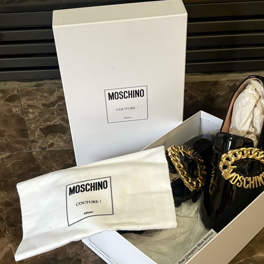 Moschino Black and Gold Flats & Loafers